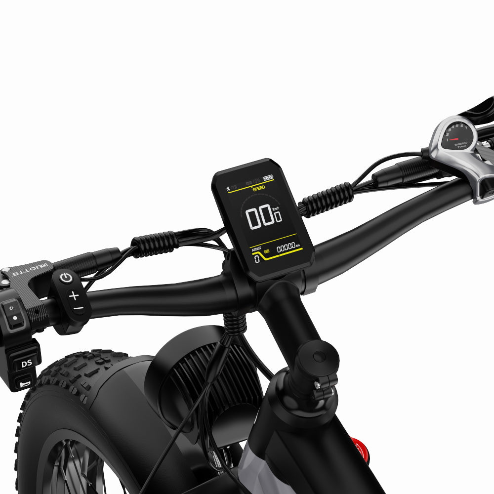 LCD-display monterad på styret av Duotts F26 Pro, visar batteristatus och hastighet.