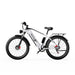  Duotts F26 Pro elcykel i vit design, visad från sidan med grova däck och kraftfull ram.