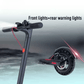 EcoDrift E9 Pro elscooter med aktiverad framlampa och röd bakre varningslampa, perfekt för säker körning i mörker och dåligt väder.