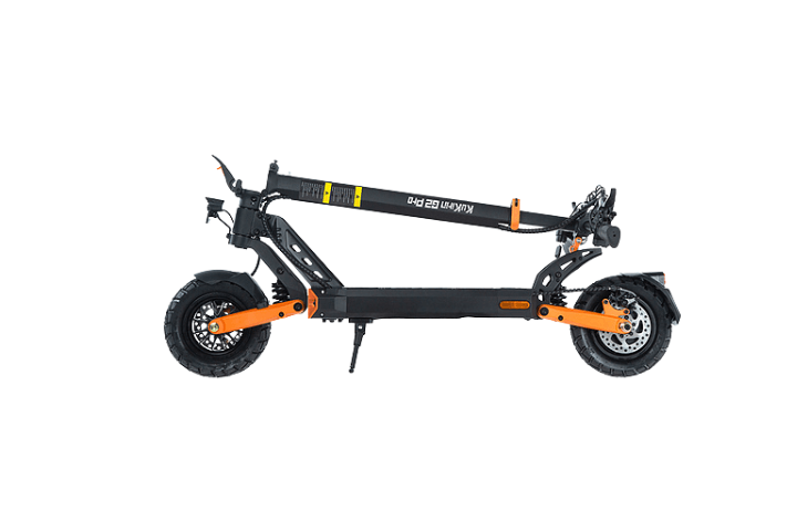 Hopfälld KuKirin G2 Pro VMP Master elskoter i svart och orange – kraftfull design med dubbla motorer, perfekt för enkel transport och förvaring.